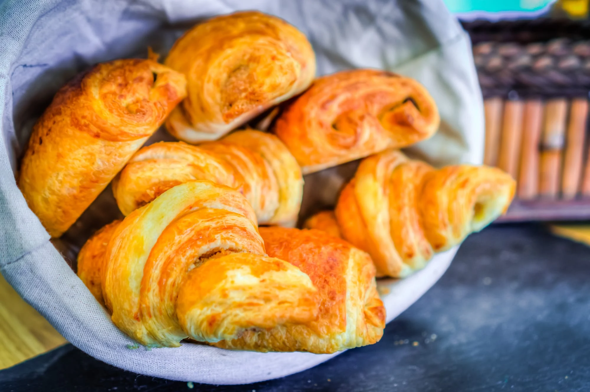 Freshly baked butter croissants with deeply golden laminated layers