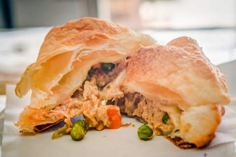 Savory hand pie with a deeply flaky crust and warm filling