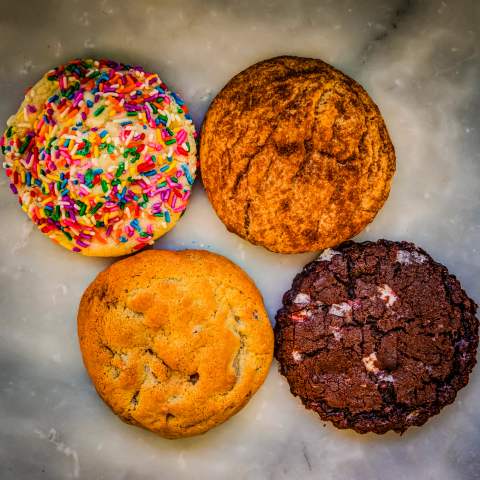 An assortment of colorful bakery cookies